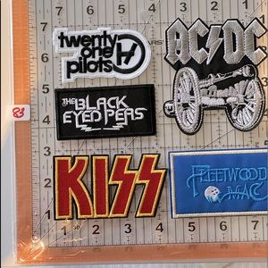 Twenty one pilots. Kiss. Fleetwood Mac. Acdc. And the black eyed peas. Iron on p